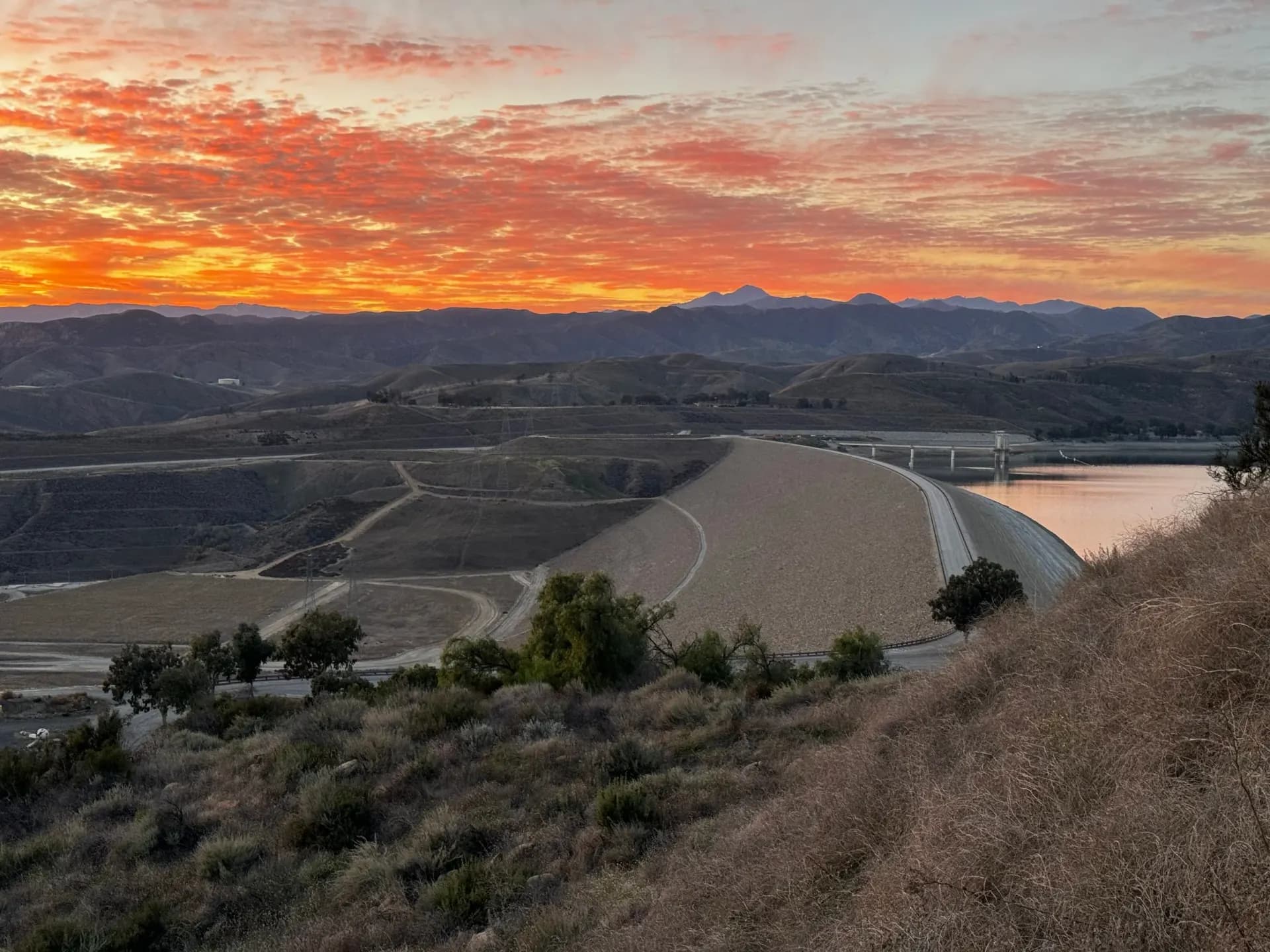 Embankment dam at sunset