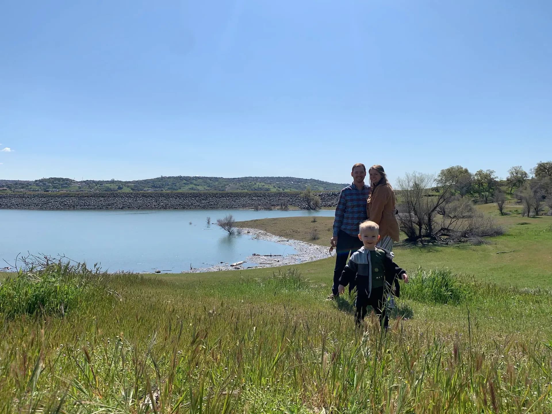 Ryan Gibeault with family on the shore of Folsom Lake